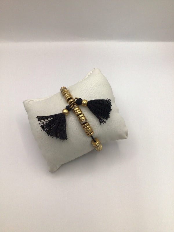 J Crew brass disk + tassle Bracelet